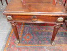A pair of hardwood and brass mounted end tables