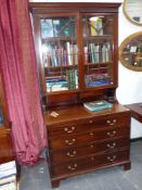 A Geo.III and later mahogany secretaire bookcase with fitted interior