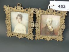 Mid 19th Century English School. Pair of watercolour miniature portraits of a gentleman and lady
