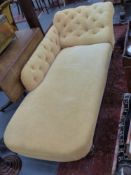 A large Victorian button back chaise longue with brass Cope & Collinson castors