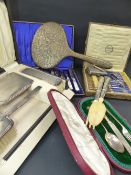 A cased hallmarked silver Art Deco style dresser set, cased fruit knives, cigarette case, etc