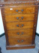 A Victorian oak side locking Wellington chest by Edwards & Roberts