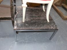 A contemporary marble top low table