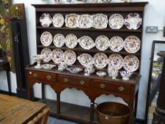 An 18th.c.oak potboard dresser with plate rack