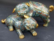 A Chinese cloisonne figural group of two playful dogs, one with lidded back