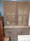 A large Victorian pine kitchen cabinet