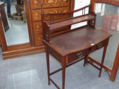 A mahogany Art Nouveau small writing table