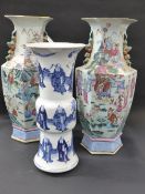 A pair of Chinese famille rose panel form vases with figural decoration together with a blue and