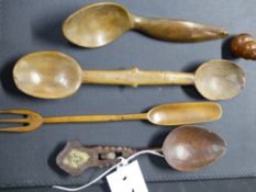 Five treen articles to include an unusual spoon with pierced and inset decoration