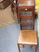 A small Arts and Crafts oak bookcase and an oak occasional table