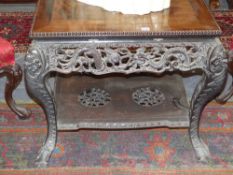 A well carved Chinese hardwood centre table pierced dragon apron with pierced undertier and ball and