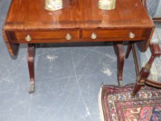 A Regency mahogany and rosewood banded sofa table