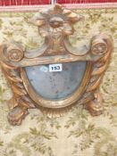 Three antique Italian carved giltwood small mirrors