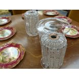 An antique glass tazza and a pair of cut glass table lustres