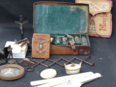 A fitted vintage leather medicine case, shoe horns and objets trouve