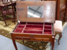 A provincial French lift top dressing table