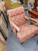 An unusual Victorian reclining library armchair
