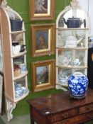 A pair of antique four tier mirror back corner shelves with painted decoration