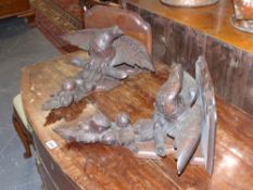 A pair of Victorian carved oak eagle wall brackets