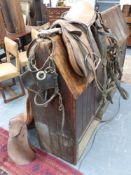 An antique pine saddle horse , saddles and tack