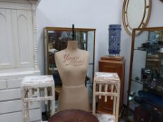 A vintage dress makers dummy or mannequin by Yugin & sons together with a pair of painted display