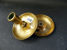 A 19th Century Brighton Bun bronze campaign candlestick set