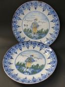 A pair of unusual Delft plates with figural decoration