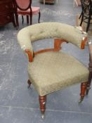 A Victorian carved satin birch large tub form desk chair