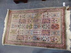 An Oriental part silk mat of Persian garden design