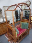 A Victorian North American canopy childs bed together with a trundle bed