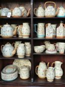 A large collection of Victorian Orientalist decorated pottery most with bamboo and floral motifs