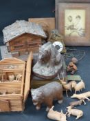 Various carved wood continental objects to include model bears, houses and oriental items