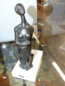 A 20th Century bronze figure of a kneeling woman on marble base