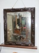 A 19th century copper clad embossed mirror