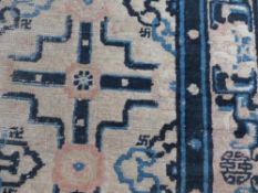 An antique Chinese rug