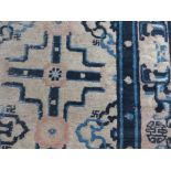 An antique Chinese rug