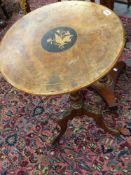 A Victorian walnut and inlaid tripod table