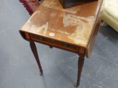 A Regency mahogany satin and boxwood crossbanded Pembroke table on slender carved and turned legs