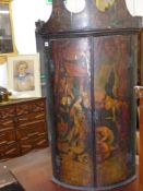A mid Georgian paint decorated bow front corner cabinet