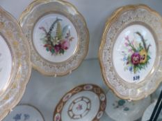 Five 19th Century Davenport cabinet plates with floral medallions and gilt decorated borders
