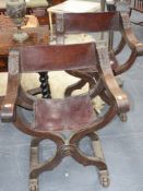 A pair of late 19th.c.continental oak x form folding chairs with leather seats and backs