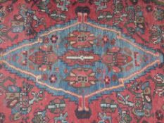 A Persian Shiraz rug and a Hamadan rug