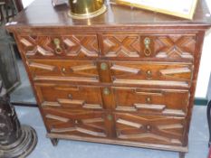 An early 18th.c.oak chest of drawers with geometric panel drawer fronts