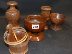 A group of five pieces of treen three cups, a piggin and a covered grinder
