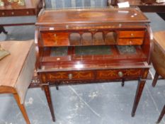 An Edwardian mahogany and inlaid tambour top writing desk