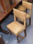 A set of six antique continental style leather upholstered dining chairs