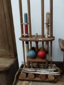 A vintage Ayres croquet set on stand