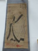 An Oriental scroll painting of an elderly gentleman. Inscribed and signed with seal mark