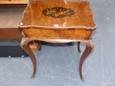 A fine 19th.c.burr walnut inlaid and gilt brass mounted lift top dressing table on deep inswept