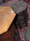 A Moorish style octagonal occasional table with incised carved decoration and a smaller deep